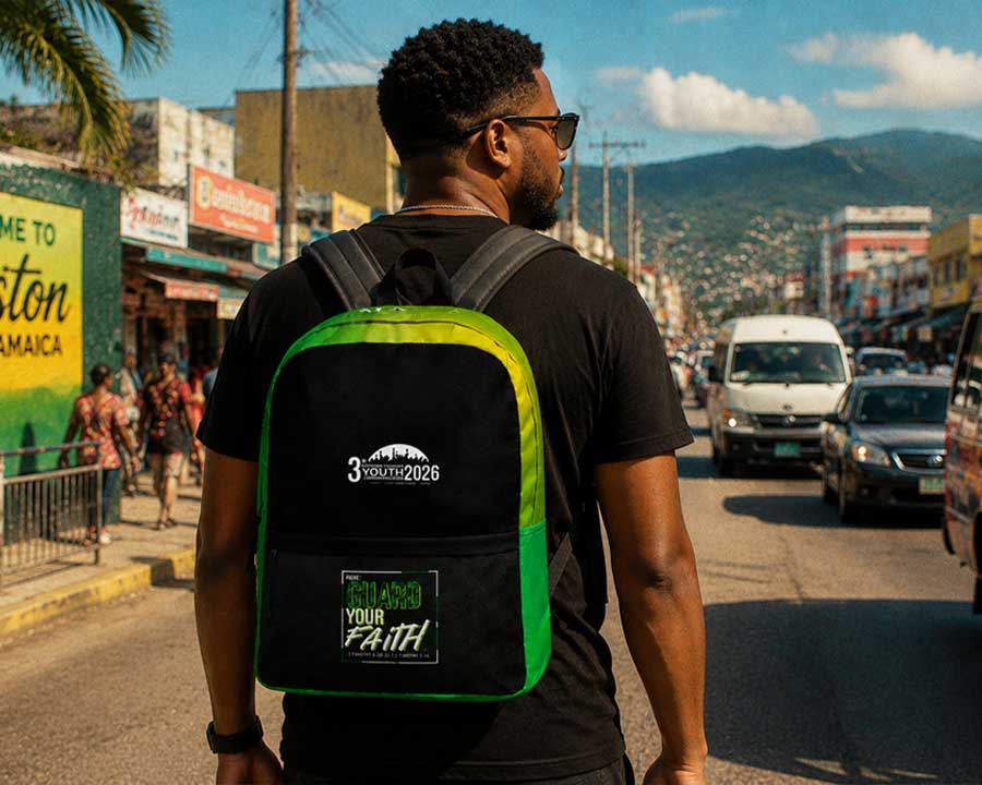 Guard Your Faith IYC 2026 backpack worn on the streets of Kingston